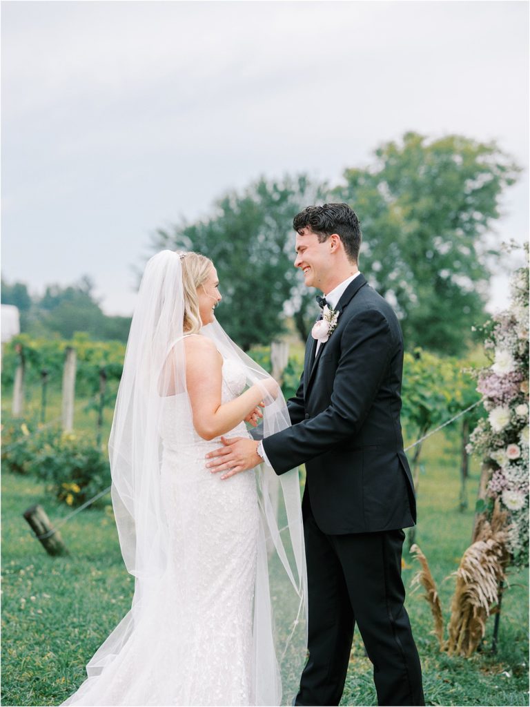 Bride and groom about to embrace after their first look