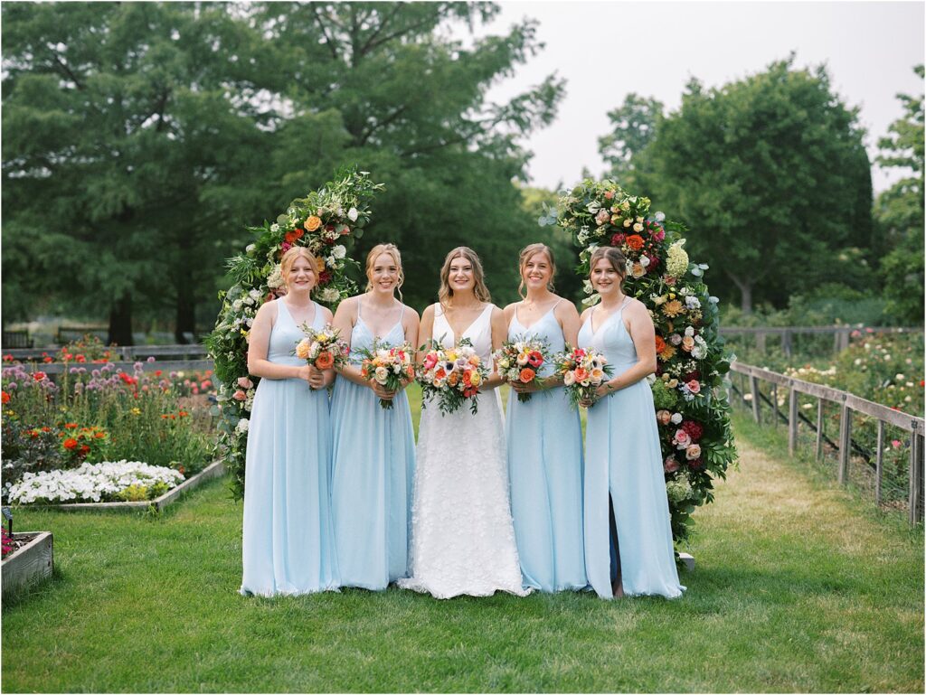 Bride and bridesmaids Reiman Gardens Ames, Iowa Wedding