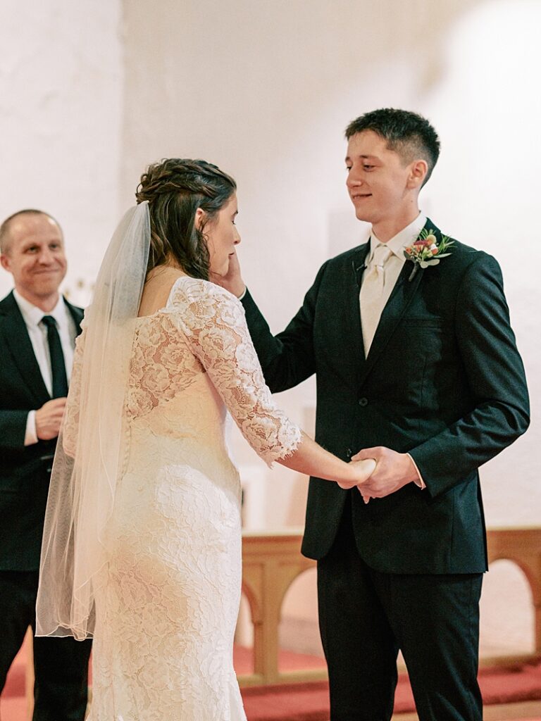 Bride and Groom during ceremony at Country Cathedral Wedding