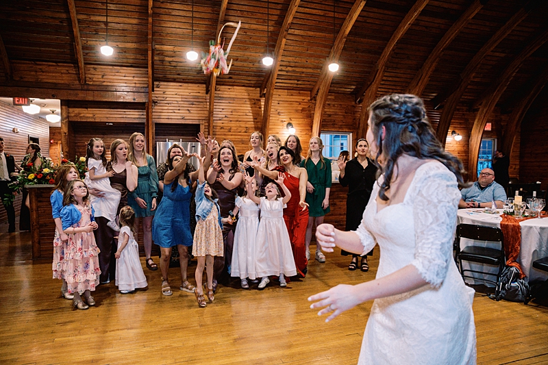 Bride tossing bouquet