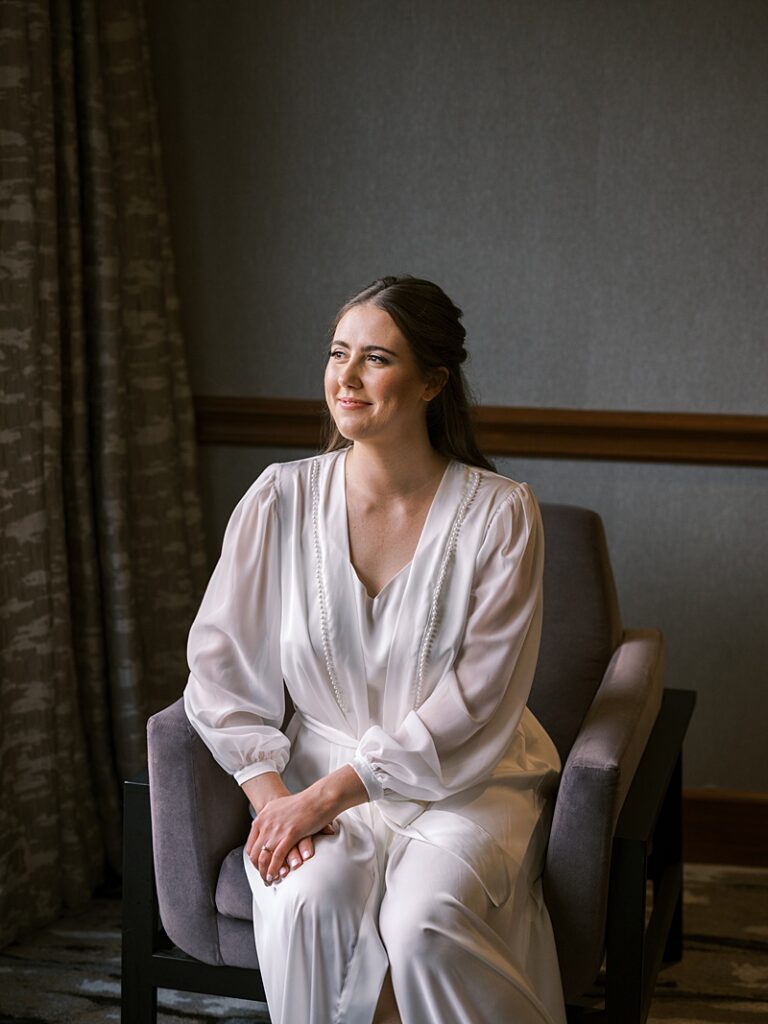 Bride getting read at Hyatt Regency Coralville