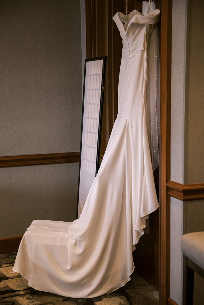 Bride's dress hung at Hyatt Regency