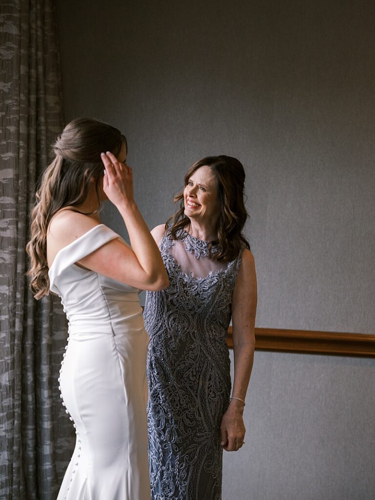 Mom and Bride getting read at Hyatt Regency Coralville