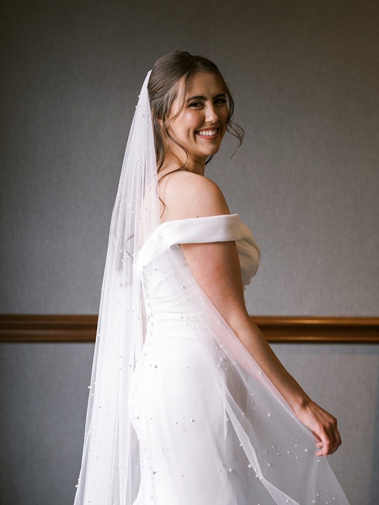 Bride getting read at Hyatt Regency Coralville